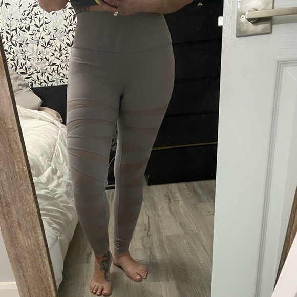 Lululemon tights with mesh cut outs. Size 10. Used - Picture 3 of 5